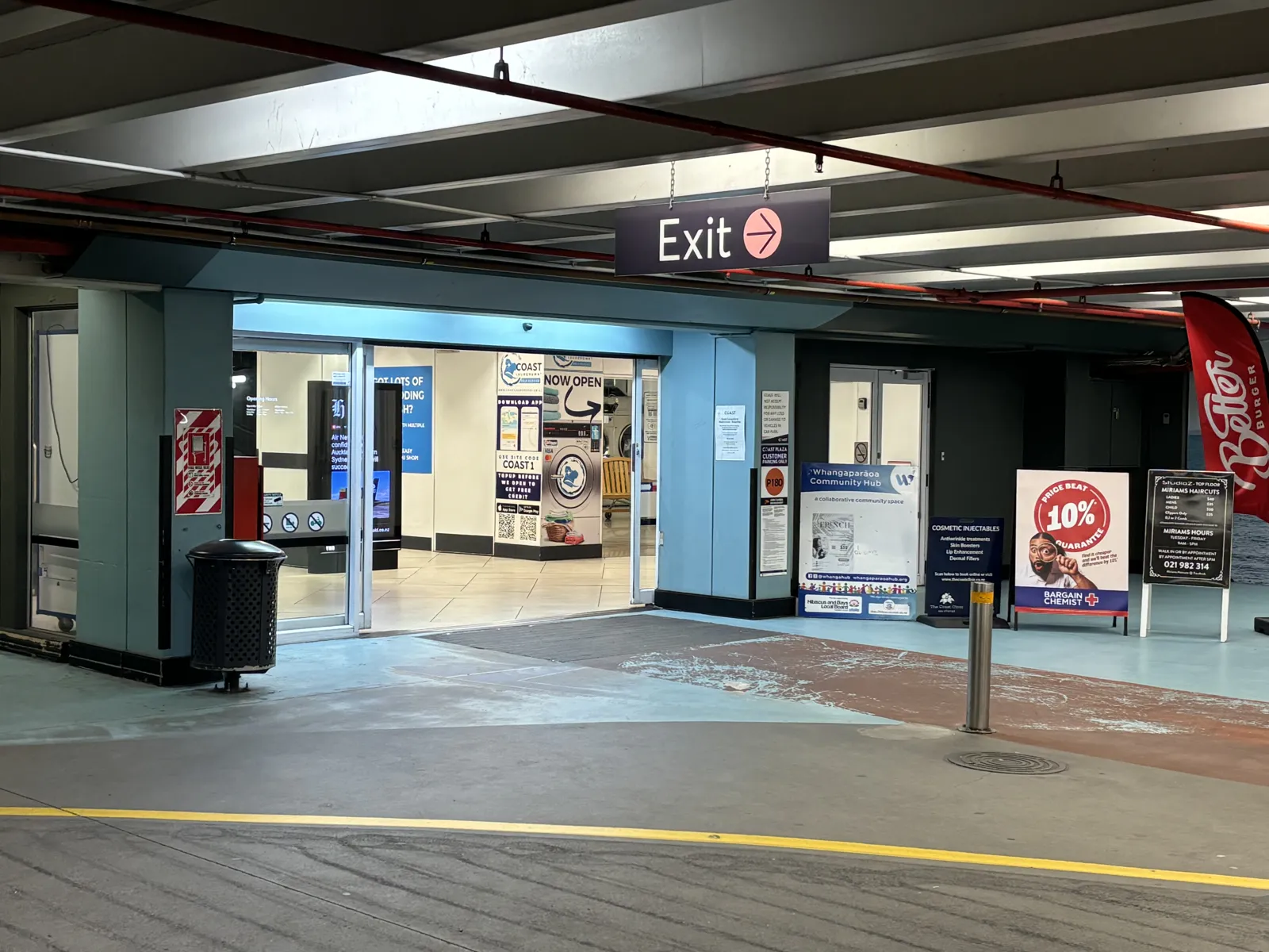 Coast Laundromat entrance and signage on Level 2 of the undercover Coast Plaza carpark